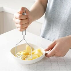 Potato Masher, Stainless Steel Potato Smasher Metal Wire Utensil For Bean, Avocado, Egg, Mini Mashed Potatoe, Banana & Other Food (Wavy Design, Silver) -KitchenAid Shop 41dyG9iv1DL