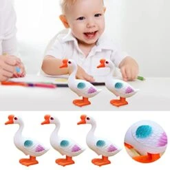 Winding Spring Toy Bouncing Big White Goose Simulation Animal Infant Enlightenment Boys And Girls Learn To Climb 1 To 8 Years Old Toy Multiplication Table -KitchenAid Shop 41unOk77uqL