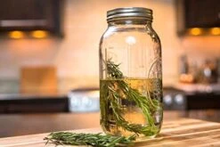 The Olive Oil & Vinegar Infusion Kit | Recipe & Instruction Book W/over 40 Recipes | Set Of 500mL Dark Green Square Bottles W/ Dispensers | 64oz Ball Mason Jar | Funnel Strainer | Kitchen Thermometer -KitchenAid Shop 41ygGXVaIXL