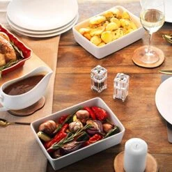 Salter 7605 CLXR Salt & Pepper Mini Grinder Set - Refillable Mills, For Travel, Camping, Caravans, Twist To Grind, 14 G Salt Crystals/7g Peppercorns, Square Design, Adjust Fine To Coarse, 9.7cm, Clear -KitchenAid Shop 511UZytx9FL