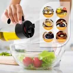 Hoforife Glass Olive Oil And Vinegar Dispenser With Auto Flip Caps For Kitchen Cooking No Drip, 17 Oz Borosilicate Glass Snap Fastener Oil Pourer Bottle Shatterproof, Leakproof (Black) -KitchenAid Shop 51PCv2vrJGL