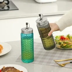 Hobnail Oil And Vinegar Dispenser Bottles 16.7 Oz. Set Of 2 Blue And Gray Colored Olive Oil Glass Bottle Set No Drip With Metal Pour Spout For Kitchen Cooking And Grilling 13 Hobnail Oil And Vinegar Dispenser Bottles 16.7 Oz. Set Of 2 Blue And Gray Colored Olive Oil Glass Bottle Set No Drip With Metal Pour Spout For Kitchen Cooking And Grilling -KitchenAid Shop 51S66AP98IL