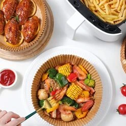 Air Fryer Disposable Paper Liner 100 PCS, Air Fryer Liners Round, Parchment Paper For Air Fryer, Non-Stick, Oil-Proof, Microwave,Air Fryer And Other Parchment Tools (6.3 Inch) -KitchenAid Shop 51lsM1wBUSL