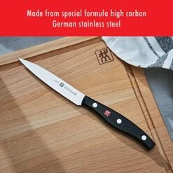 ZWILLING Twin Signature 4-inch Paring Knife, Razor-Sharp, Made In Company-Owned German Factory With Special Formula Steel Perfected For Almost 300 Years, Dishwasher Safe -KitchenAid Shop 51vx3A1n9CL